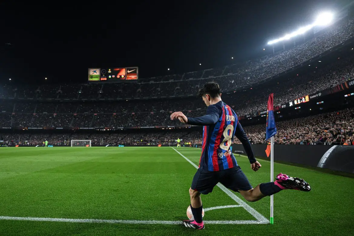 Pedri takes a corner for Barcelona.