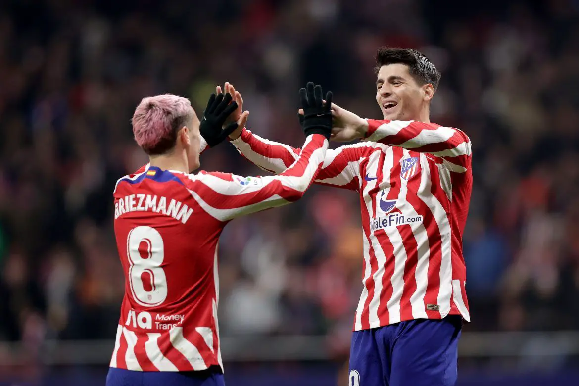 Álvaro Morata celebrates with Antoine Griezmann.