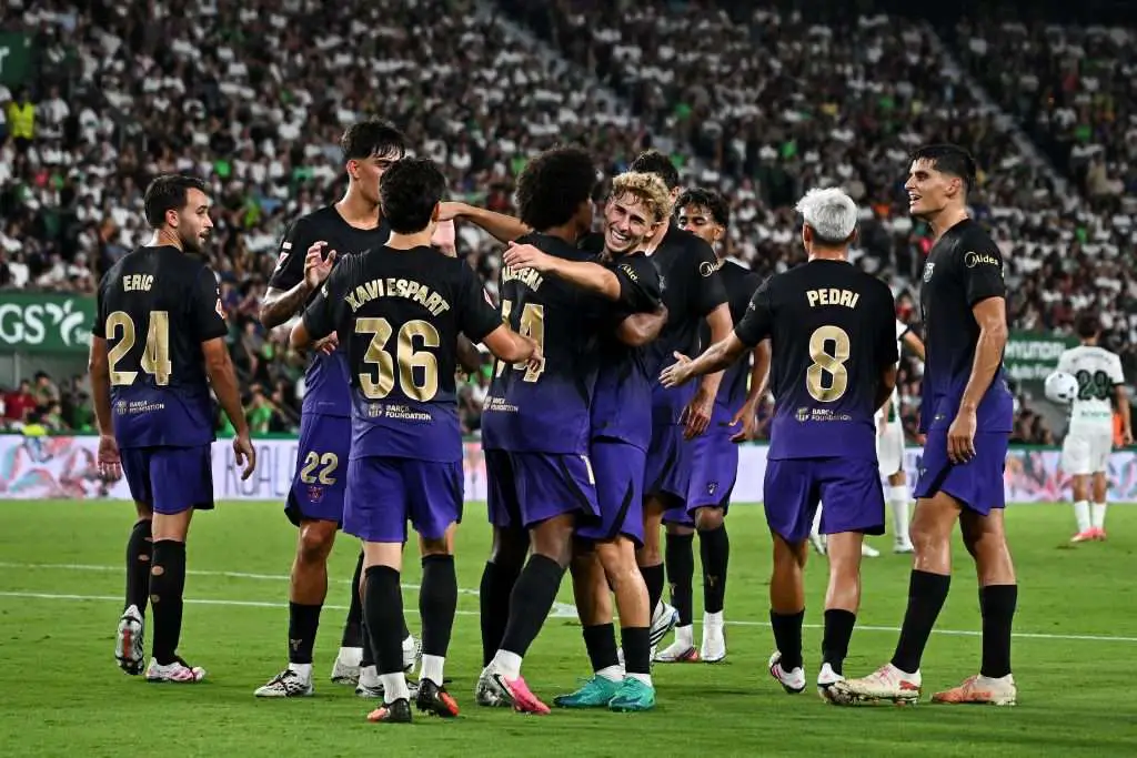 Barcelona players celebrate during the 5-0 win over Elche